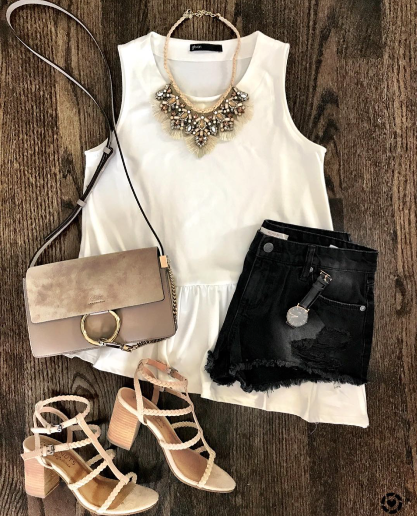 white peplum and denim shorts