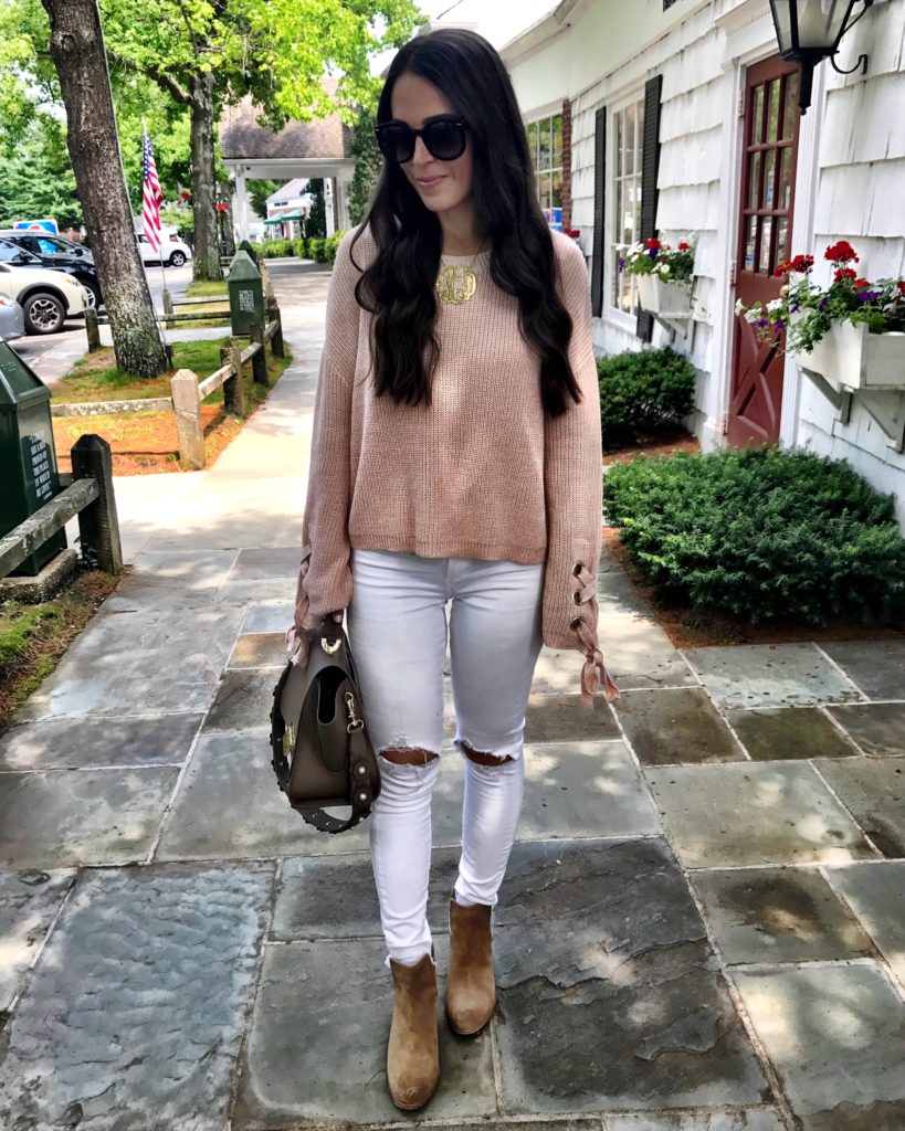 blush pink sweater and white jeans